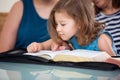 Family Reading the Bible Together Royalty Free Stock Photo