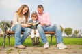 Family reading a book Royalty Free Stock Photo