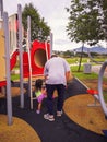 Family recreation at the playground. Climbing and being active