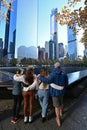 Family at reflecting pool at National September 11 Memorial in New York. Royalty Free Stock Photo