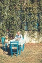 Family relations of parent and kid enjoying summer. Father and son at outdoor cafe. Man smile to his baby boy in Royalty Free Stock Photo