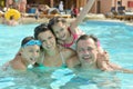 Family relax in pool