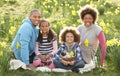 Family Relaxing In Field Of Spring Daffodils Royalty Free Stock Photo