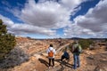 Family relaxing on hiking trail in Utah. Royalty Free Stock Photo