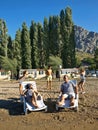 Family relaxing on the sand beach Royalty Free Stock Photo