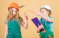 Family remodeling house. Children sisters renovation their room. Control renovation process. Kids happy renovating home Royalty Free Stock Photo