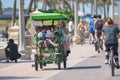 Family on a rental bike Hollywood Beach FL