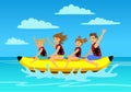 Family riding banana boat. summer vacation time