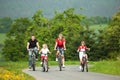 Family riding bicycles