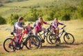 Family riding bikes in the mountains Royalty Free Stock Photo