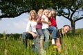 Family riding daddy Royalty Free Stock Photo