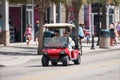 Family riding a rental golf cart on Myrtle Beach SC Royalty Free Stock Photo