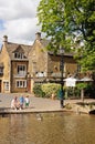 Family at riverside, Bourton on the Water.