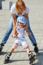 Family rollerblading Royalty Free Stock Photo