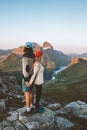 Family romantic couple in Norway hiking mountains. Man and woman in love enjoying sunset nature view Royalty Free Stock Photo