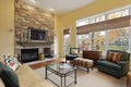 Family room with stone fireplace Royalty Free Stock Photo