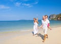 Family running beach Happiness Playful Concept Royalty Free Stock Photo