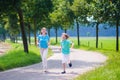 Family running in a field Royalty Free Stock Photo