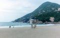 Family running and playing on the beach of the village of Shek O near Hong Kong early in the morning - 1 Royalty Free Stock Photo