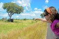 Family safari vacation in Africa, child in car looking at elephant in savannah, Kruger national park Royalty Free Stock Photo