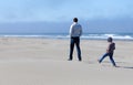 Family in sand dunes Royalty Free Stock Photo