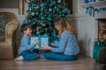 Family scene mom  and kid , Christmas time Royalty Free Stock Photo