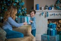 Family scene mom  and kid , Christmas time Royalty Free Stock Photo