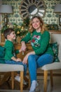 Family scene mom  and kid , Christmas time Royalty Free Stock Photo