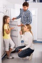 Family selecting refrigerator