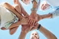 Family share a connection thatll never keep them apart. Low angle shot of a happy family joining their hands together