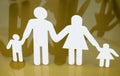 Family silhouettes with children isolated on yellow background