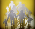 Family silhouettes with children isolated on yellow background