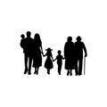 Family silhouettes grandparents father mother and three children from back
