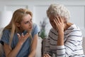 Grownup daughter proves her right aggressively argue with elderly mother Royalty Free Stock Photo