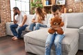 Family sitting on sofa and kid sad for partents argue at home Royalty Free Stock Photo