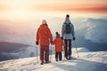 Family ski vacation. Group of young skiers in the Alps mountains. Mother and children skiing in winter. Parents teach