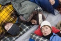 Family Sleeping In Tent