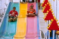 Family Slides Down Fun Slide At Atlanta Fair Royalty Free Stock Photo