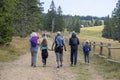 Family with small children hiking outdoors in summer nature, walking in Rogla Royalty Free Stock Photo