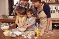 Family, smile and children baking, learning or happy boys bonding together with parents in home. Father, mother and kids Royalty Free Stock Photo