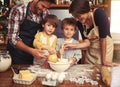 Family, smile and portrait of kids baking in kitchen, learning or happy boys bonding together with parents in home Royalty Free Stock Photo