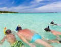 Family snorkeling in sea Royalty Free Stock Photo