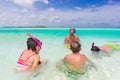 Family snorkeling in sea Royalty Free Stock Photo