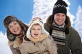 Family in snow at winter Royalty Free Stock Photo