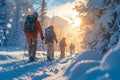 Family snowshoe outing Winter fun and exploration on snowy paths Royalty Free Stock Photo