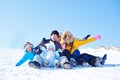 Family on a snowy hill Royalty Free Stock Photo