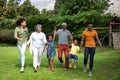 Family spending time together in the garden Royalty Free Stock Photo