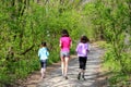 Family sport, happy active mother and kids jogging outdoors Royalty Free Stock Photo