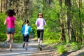 Family sport, happy active mother and kids jogging outdoors Royalty Free Stock Photo