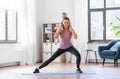 Happy mother with little baby exercising at home Royalty Free Stock Photo